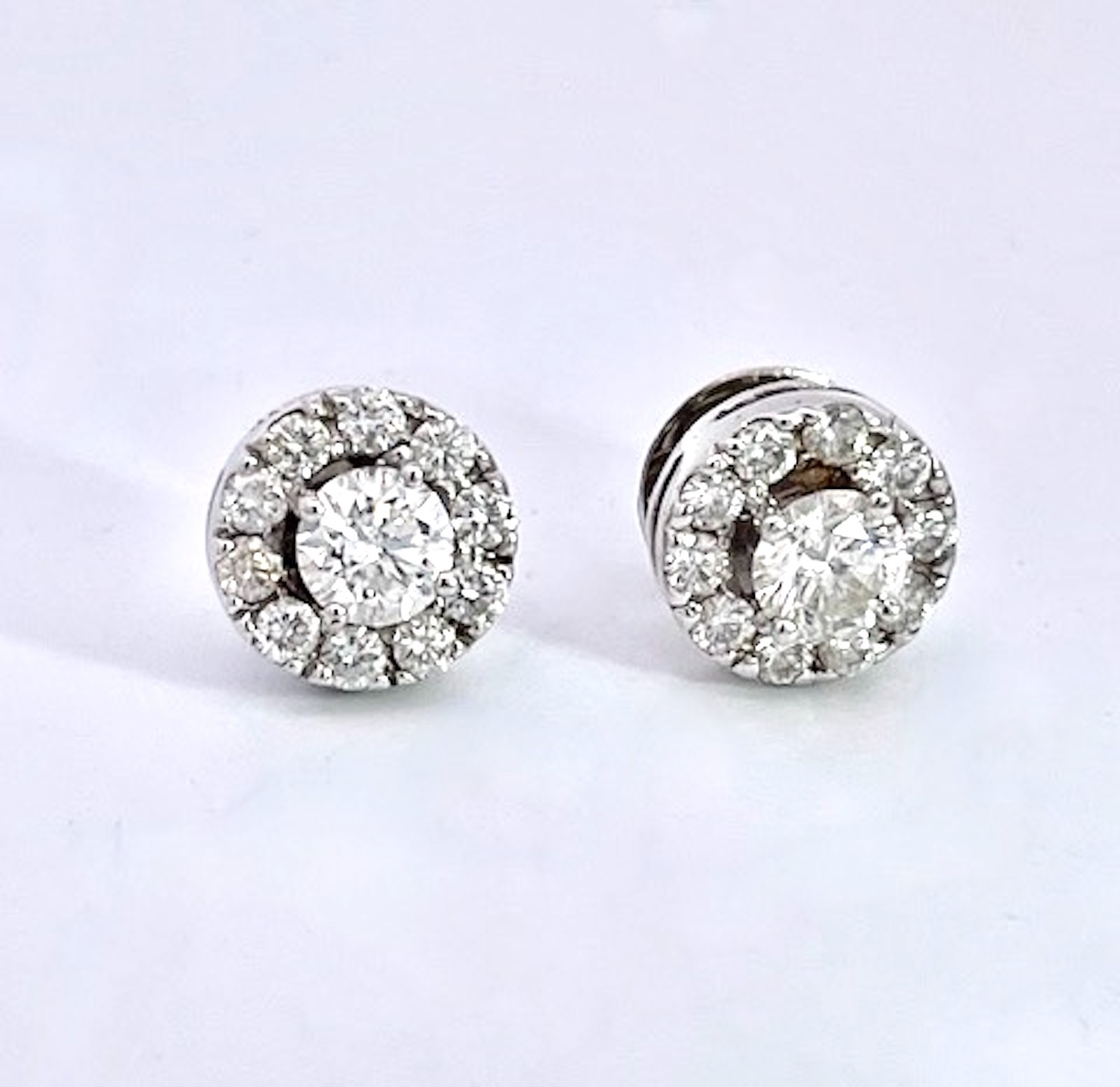 Diamond Stud Earrings with a Diamond surround 18K